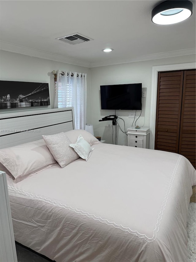 bedroom featuring ornamental molding