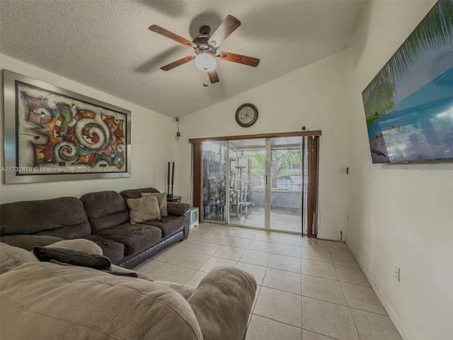 tiled living room with vaulted ceiling, ceiling fan, and a textured ceiling