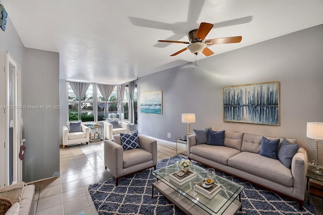 tiled living room featuring ceiling fan