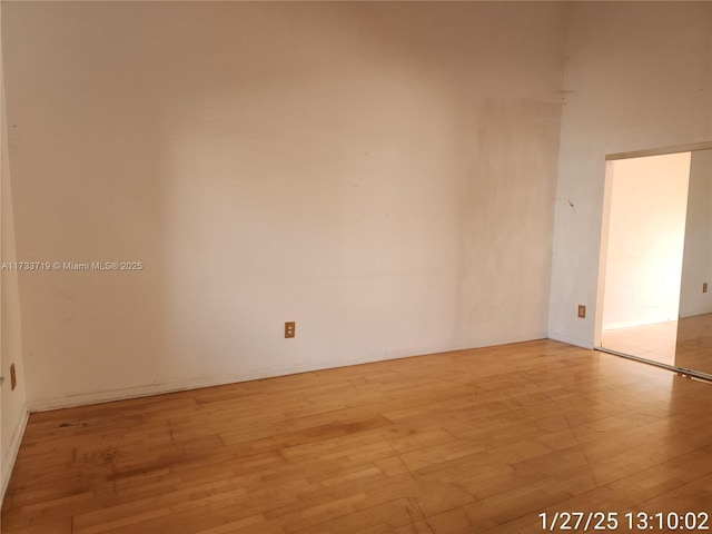 unfurnished room featuring light hardwood / wood-style flooring