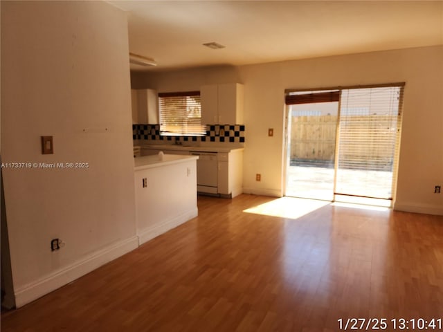 unfurnished living room featuring light hardwood / wood-style flooring