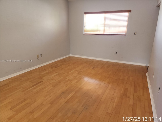 empty room with light wood-type flooring