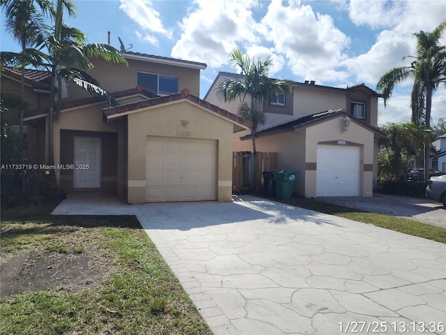 view of front of home with a garage