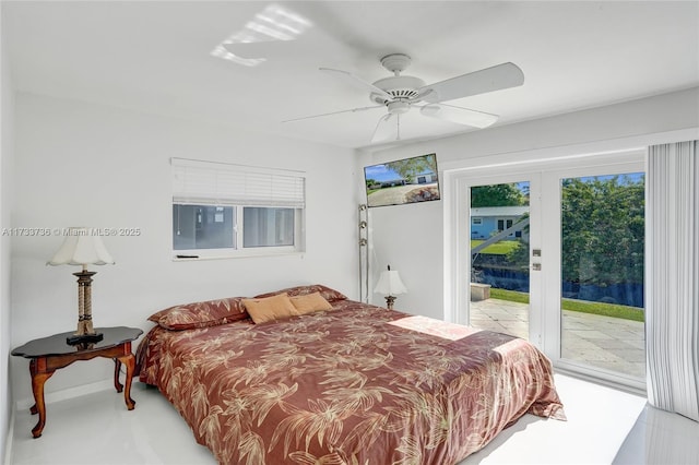 bedroom featuring access to exterior and ceiling fan