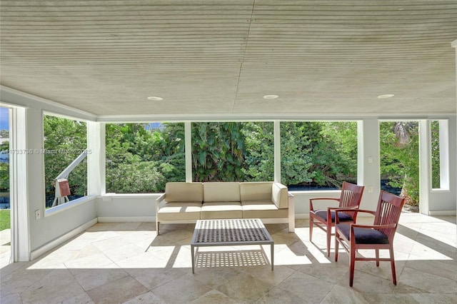 2720 SW 19th St, Fort Lauderdale, FL 33312 - sunroom featuring healthy amount of natural light, an outdoor hangout area, stone finish flooring, and wooden ceiling