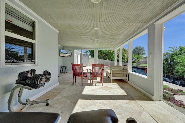 2720 SW 19th St, Fort Lauderdale, FL 33312 - sunroom featuring stone finish flooring and wooden ceiling