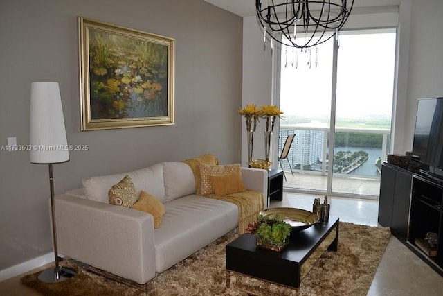 living room with an inviting chandelier