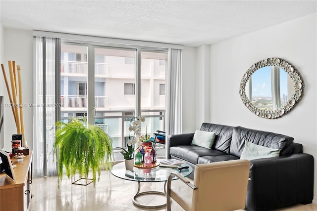 6917 Collins Ave Unit 1512, Miami Beach, FL 33141 - living room with tile patterned flooring and a textured ceiling