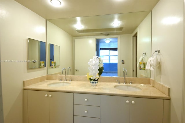 6917 Collins Ave Unit 1512, Miami Beach, FL 33141 - full bathroom featuring a sink and double vanity