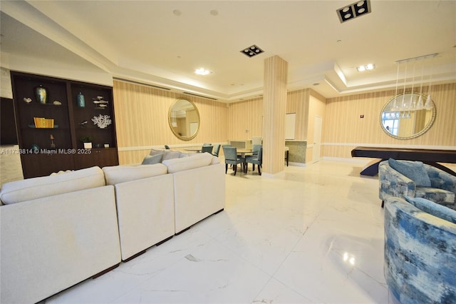 6917 Collins Ave Unit 1512, Miami Beach, FL 33141 - living area with a tray ceiling and marble finish floor