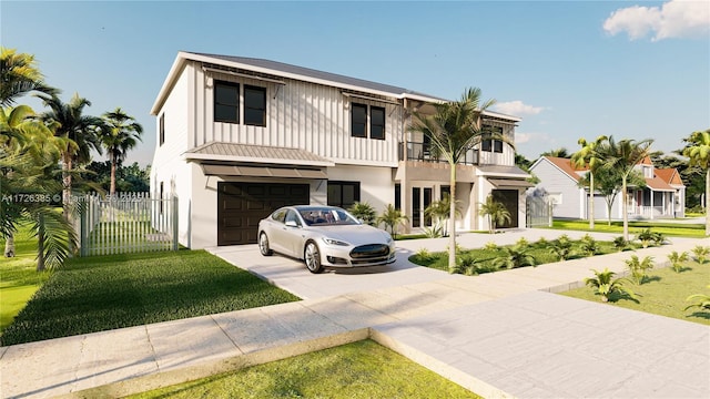 view of front of house featuring a balcony, a garage, and a front lawn