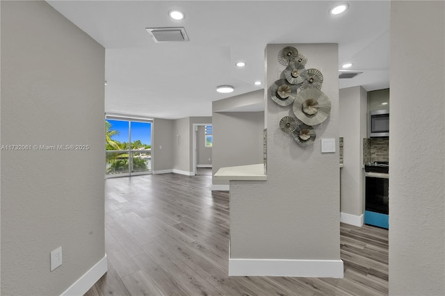 interior space with light hardwood / wood-style floors