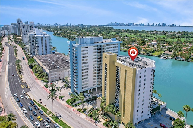 birds eye view of property featuring a water view