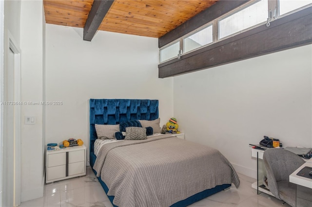 bedroom with marble finish floor, wood ceiling, baseboards, and beam ceiling