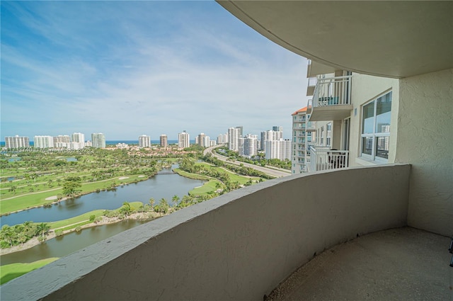 balcony featuring a water view