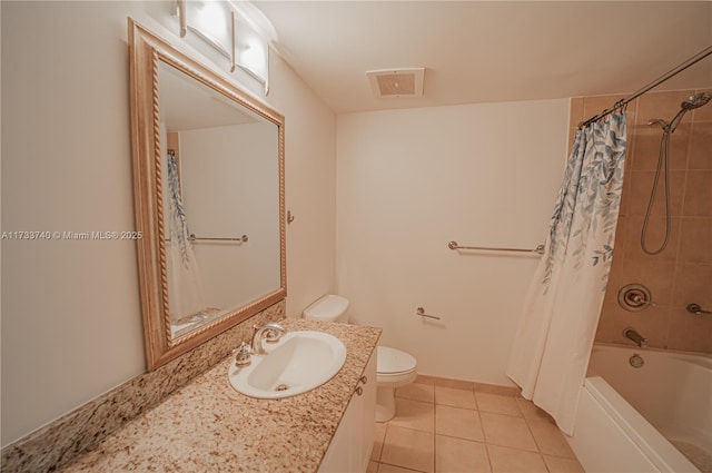 full bathroom with toilet, vanity, tile patterned floors, and shower / bath combo with shower curtain