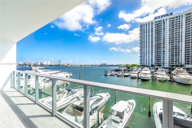 balcony featuring a water view