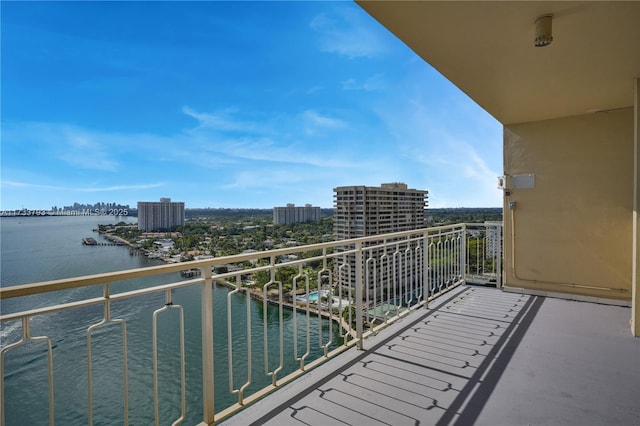 balcony featuring a water view