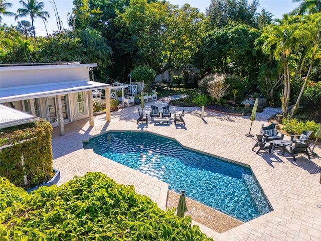 view of pool featuring a patio