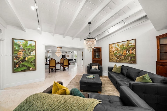 living room with a notable chandelier, wood ceiling, track lighting, and lofted ceiling with beams