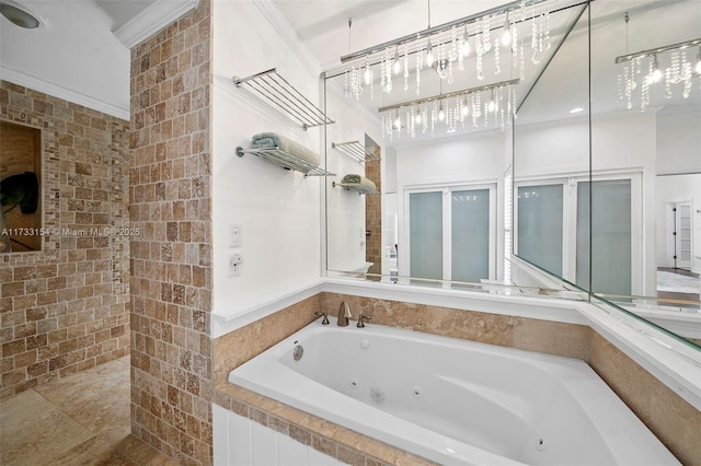 bathroom featuring tiled tub and crown molding