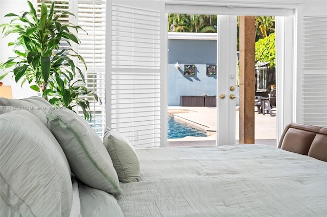 bedroom featuring french doors and access to exterior