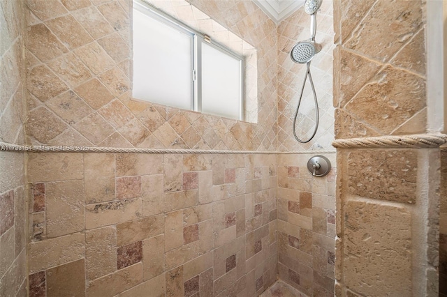 bathroom featuring tiled shower