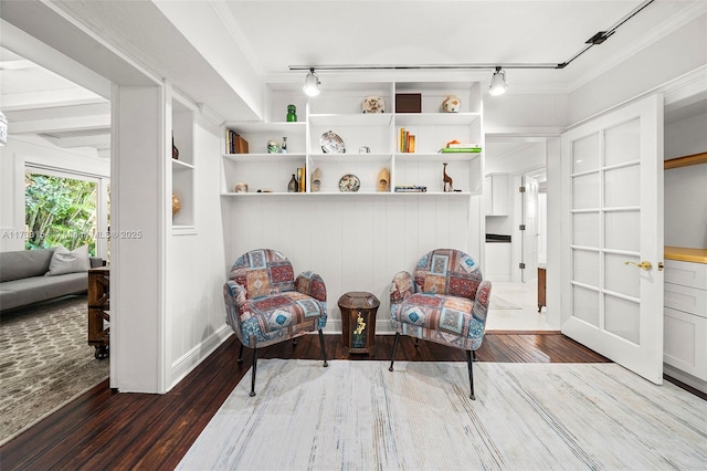 living area with hardwood / wood-style floors