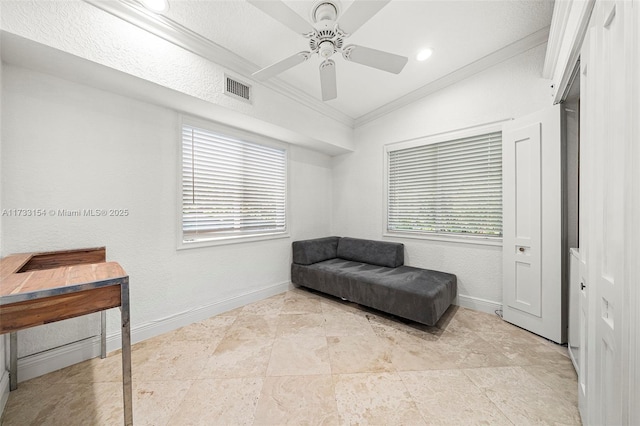 living area featuring ornamental molding, lofted ceiling, and ceiling fan