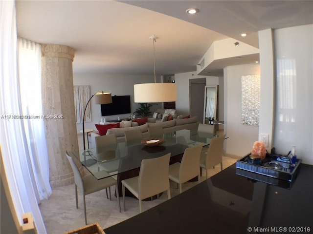 dining space featuring recessed lighting and visible vents