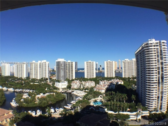 property's view of city with a water view