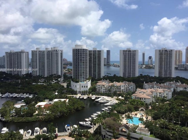 property's view of city featuring a water view