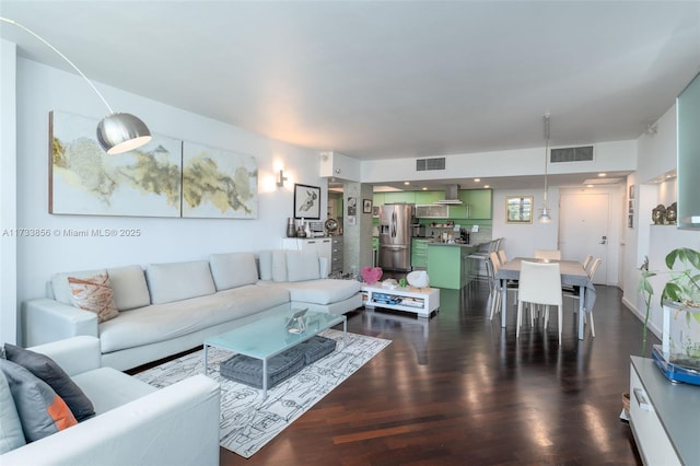 living room with dark wood-type flooring