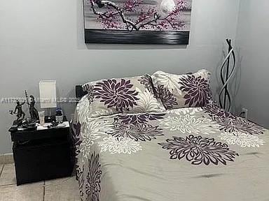 bedroom with tile patterned flooring