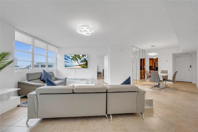 living room featuring light tile patterned flooring