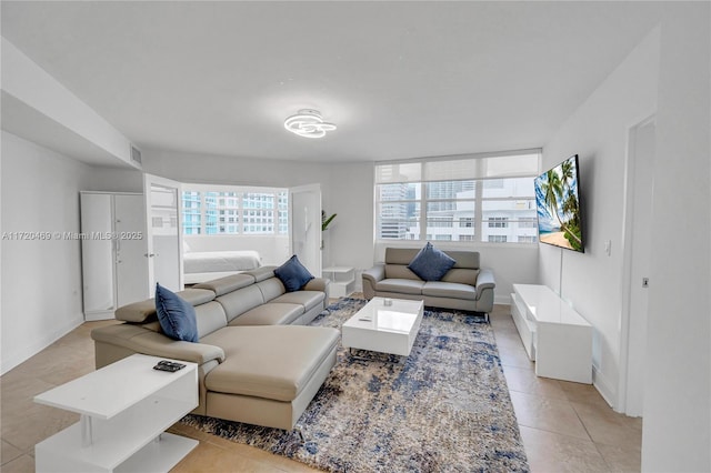 living room featuring light tile patterned floors