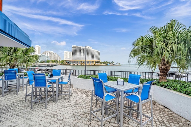 view of patio featuring a water view