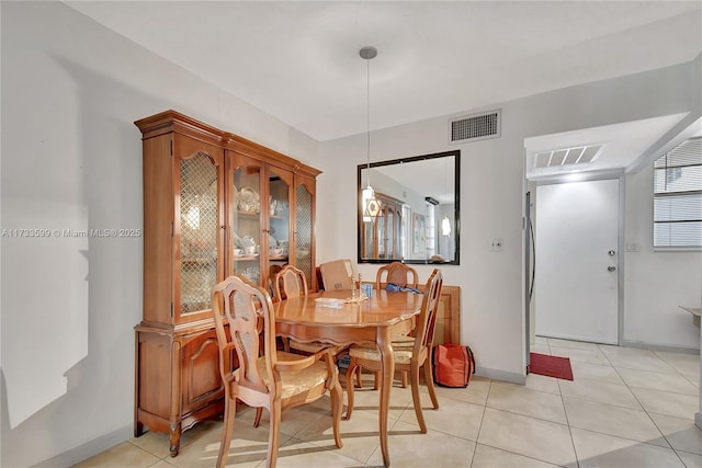 dining room featuring light tile patterned floors