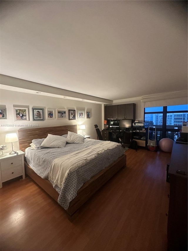 bedroom with wood-type flooring