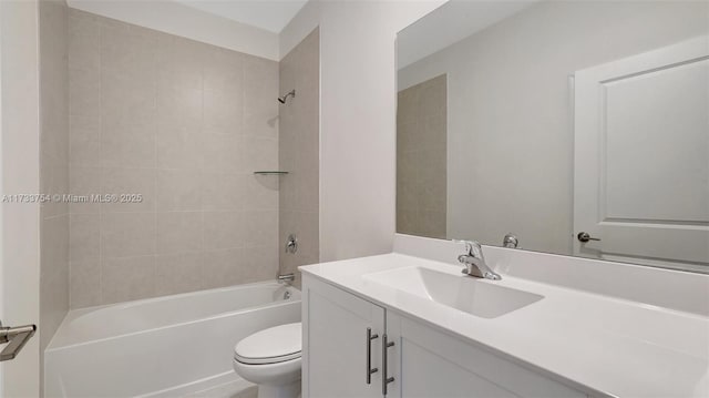 full bathroom with tiled shower / bath combo, vanity, and toilet