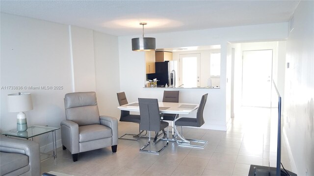 dining space with baseboards