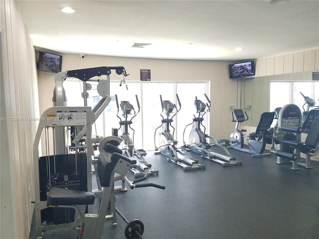 exercise room featuring visible vents