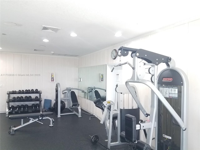 exercise room with visible vents and recessed lighting