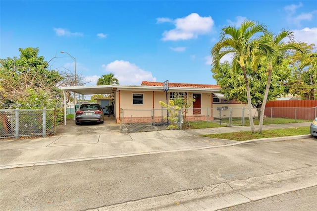 view of front of house featuring a carport