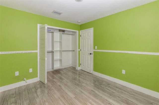 8196 SW 163rd Ct, Miami, FL 33193 - unfurnished bedroom with wood finished floors and a closet