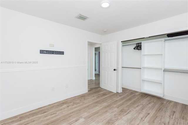 8196 SW 163rd Ct, Miami, FL 33193 - unfurnished bedroom featuring wood finished floors and a closet