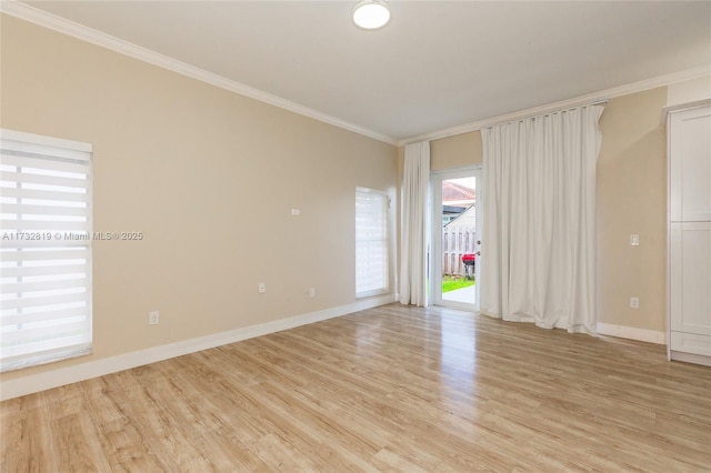 8196 SW 163rd Ct, Miami, FL 33193 - spare room featuring ornamental molding and light wood-style flooring