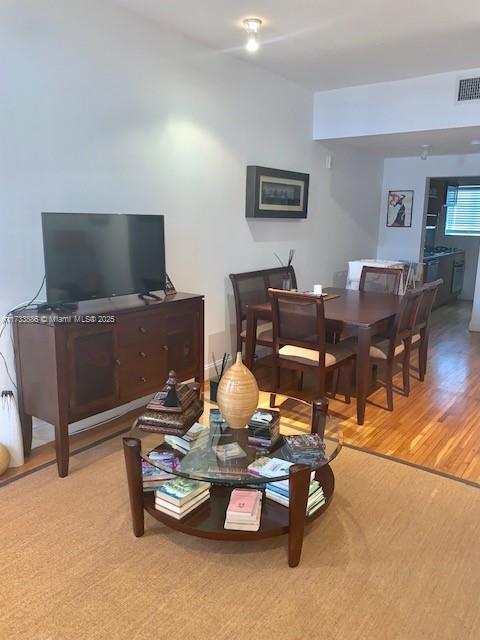 living room with light hardwood / wood-style floors