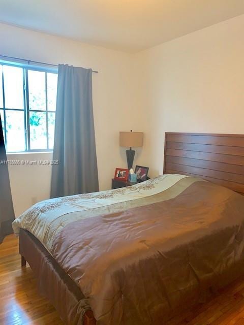 bedroom featuring light hardwood / wood-style floors