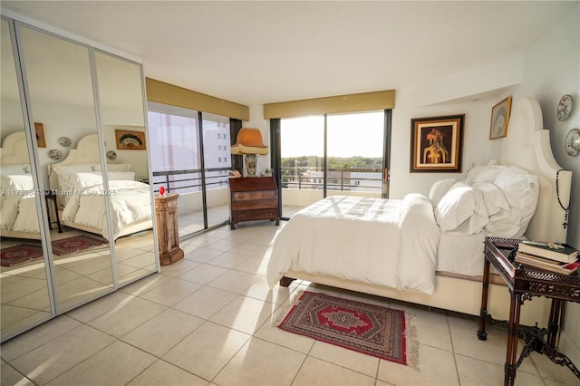 bedroom featuring light tile patterned floors